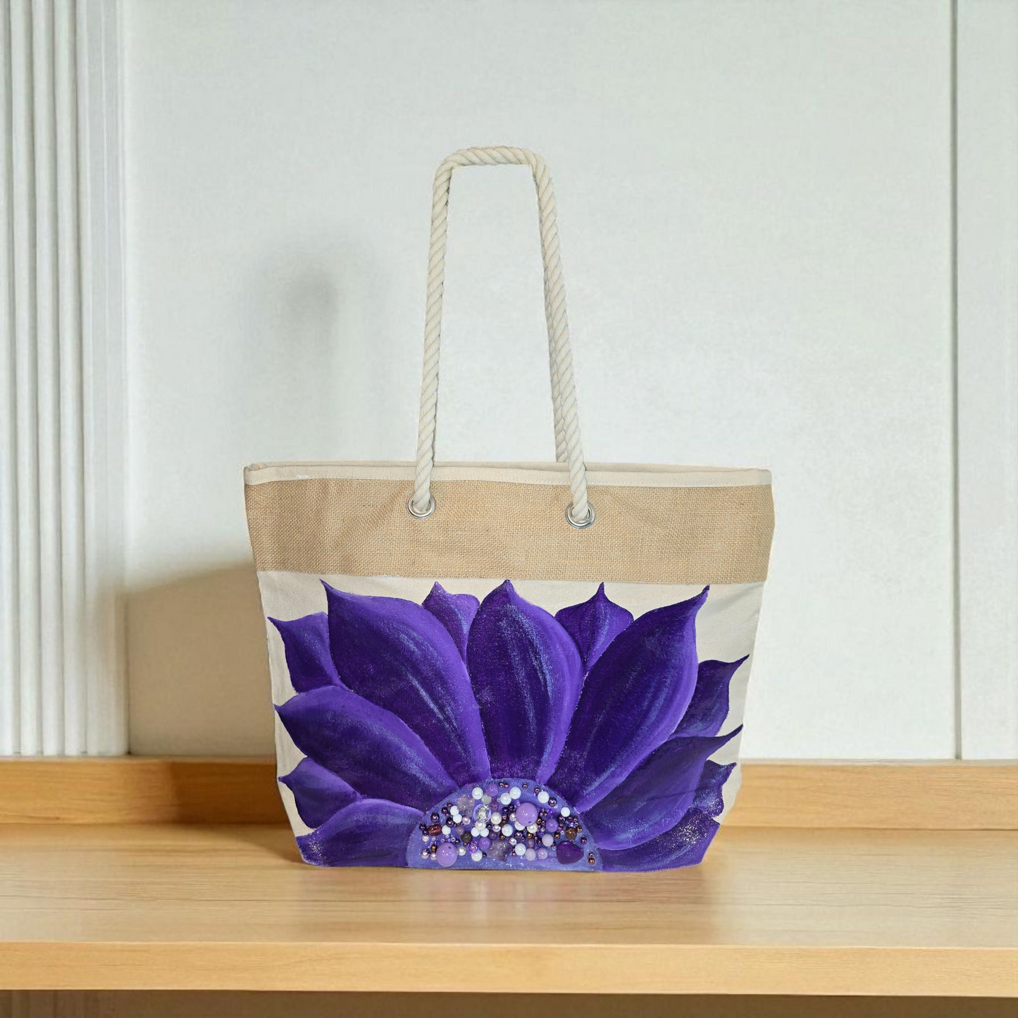 Hand-painted rope handle tote bag featuring a vibrant purple sunflower with bead embellishments.