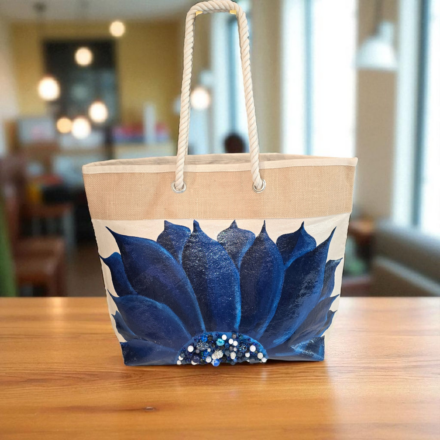 Hand-painted rope handle tote bag with a deep blue sunflower and bead embellishments.
