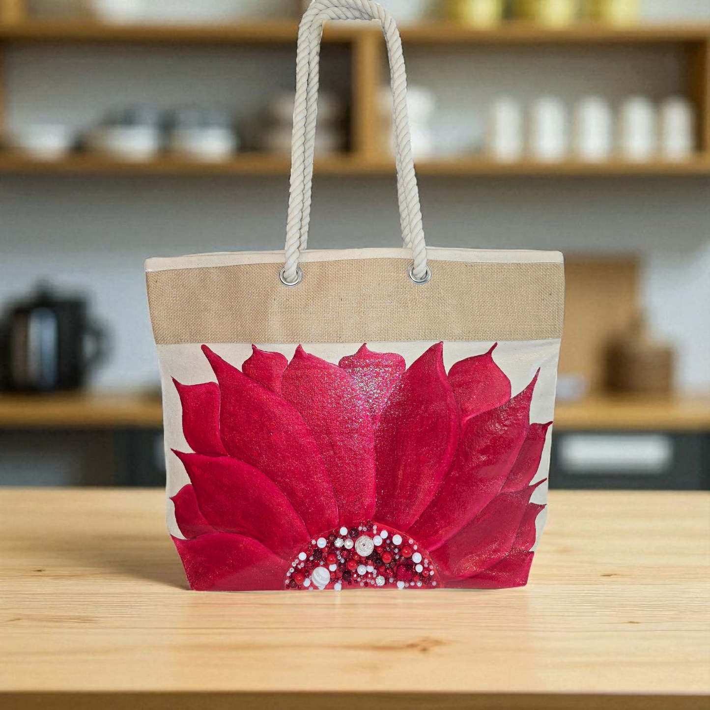 Hand-painted rope handle tote bag featuring a bold red sunflower with bead embellishments.