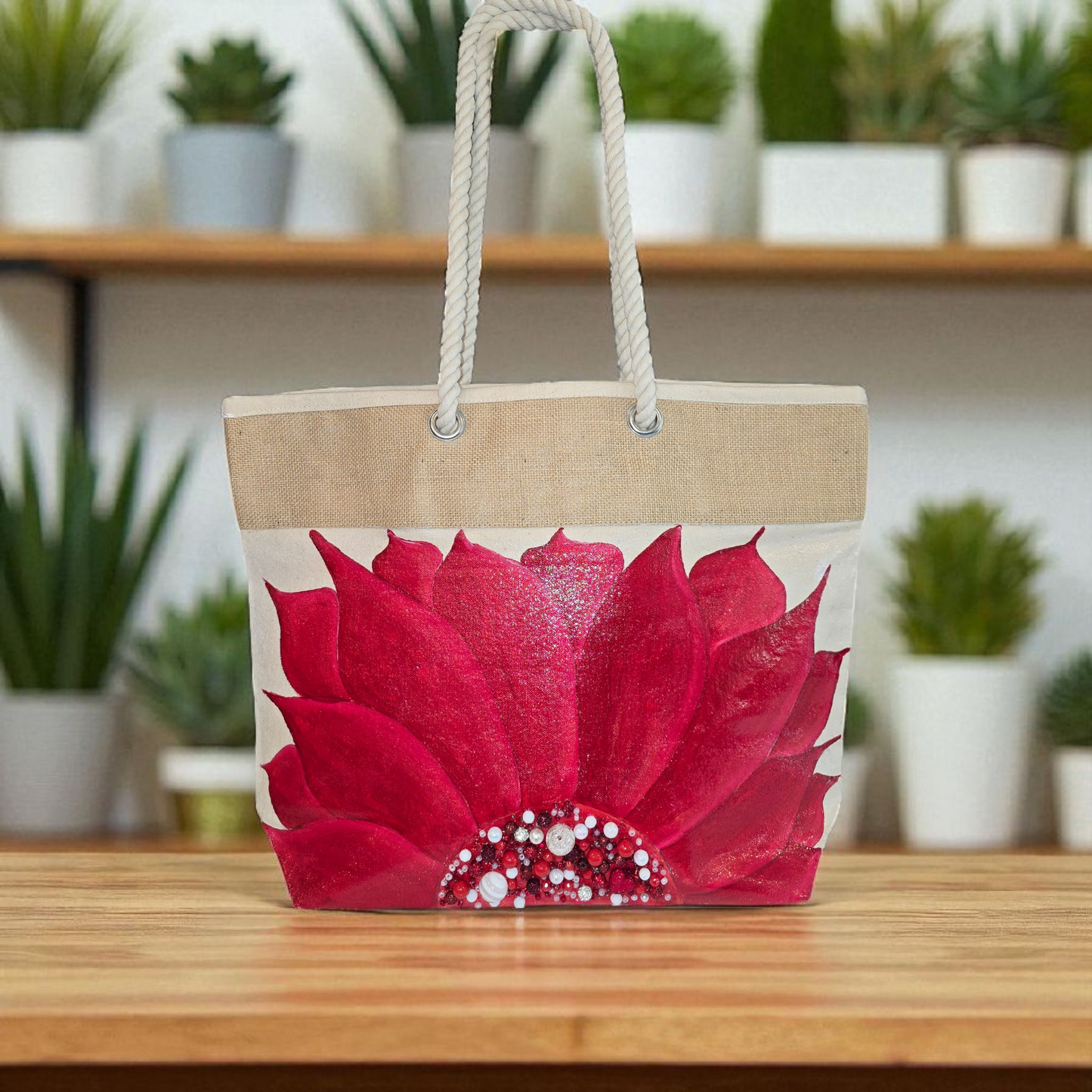 Hand-painted rope handle tote bag featuring a bold red sunflower with bead embellishments.