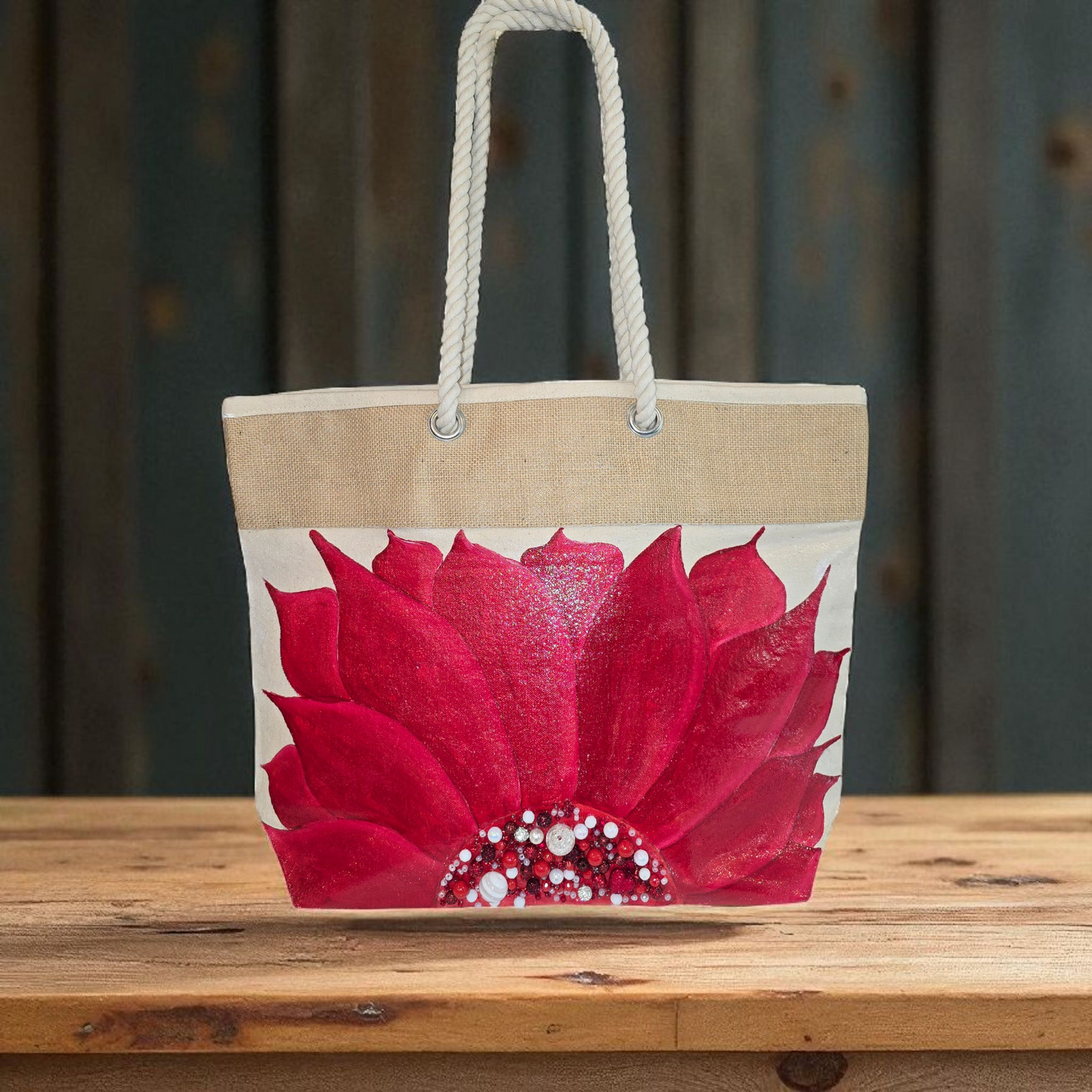 Hand-painted rope handle tote bag featuring a bold red sunflower with bead embellishments.