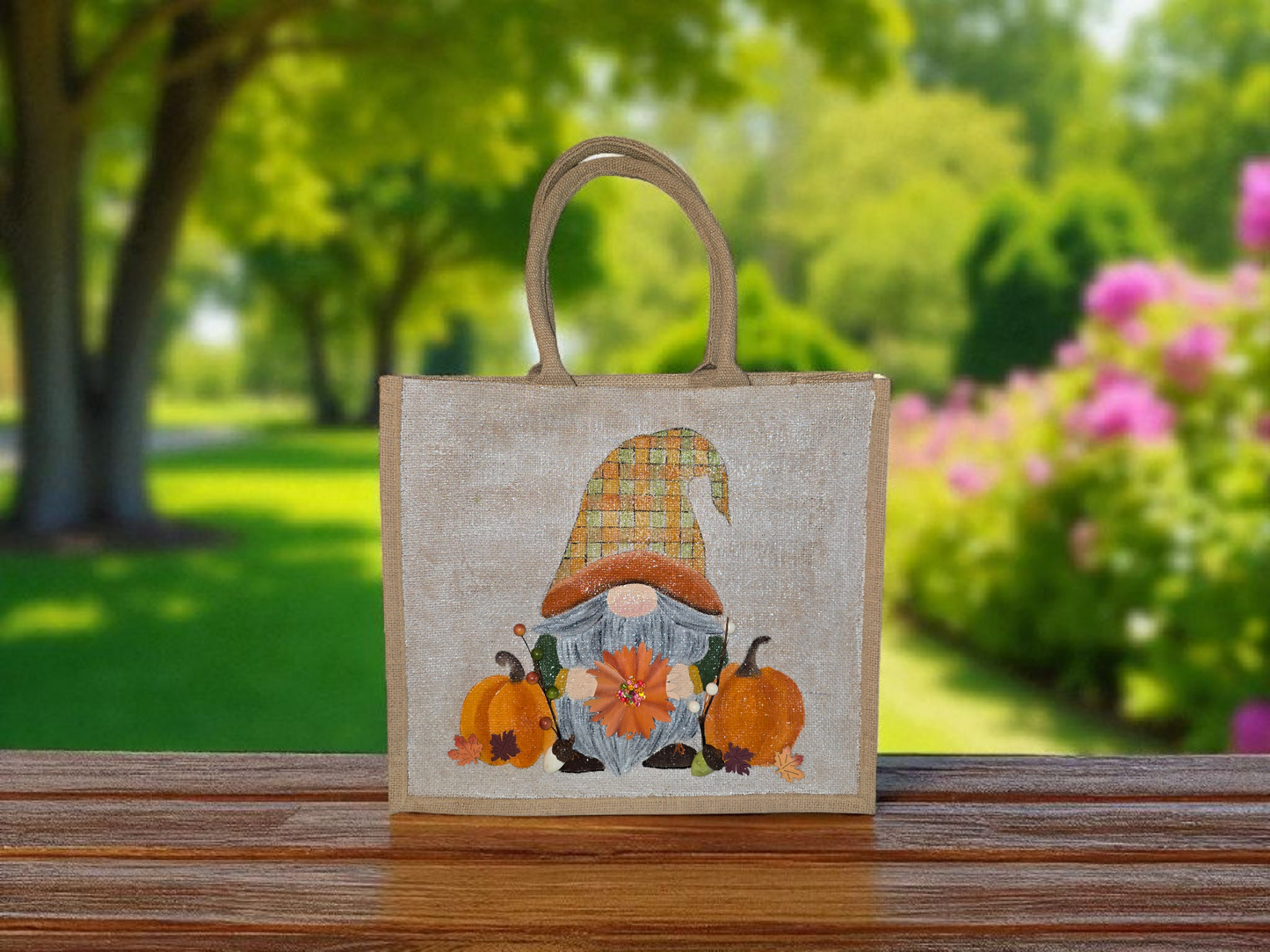 Hand-painted Fall Gnome tote bag with sunflowers, acorns, and berries on metallic jute background