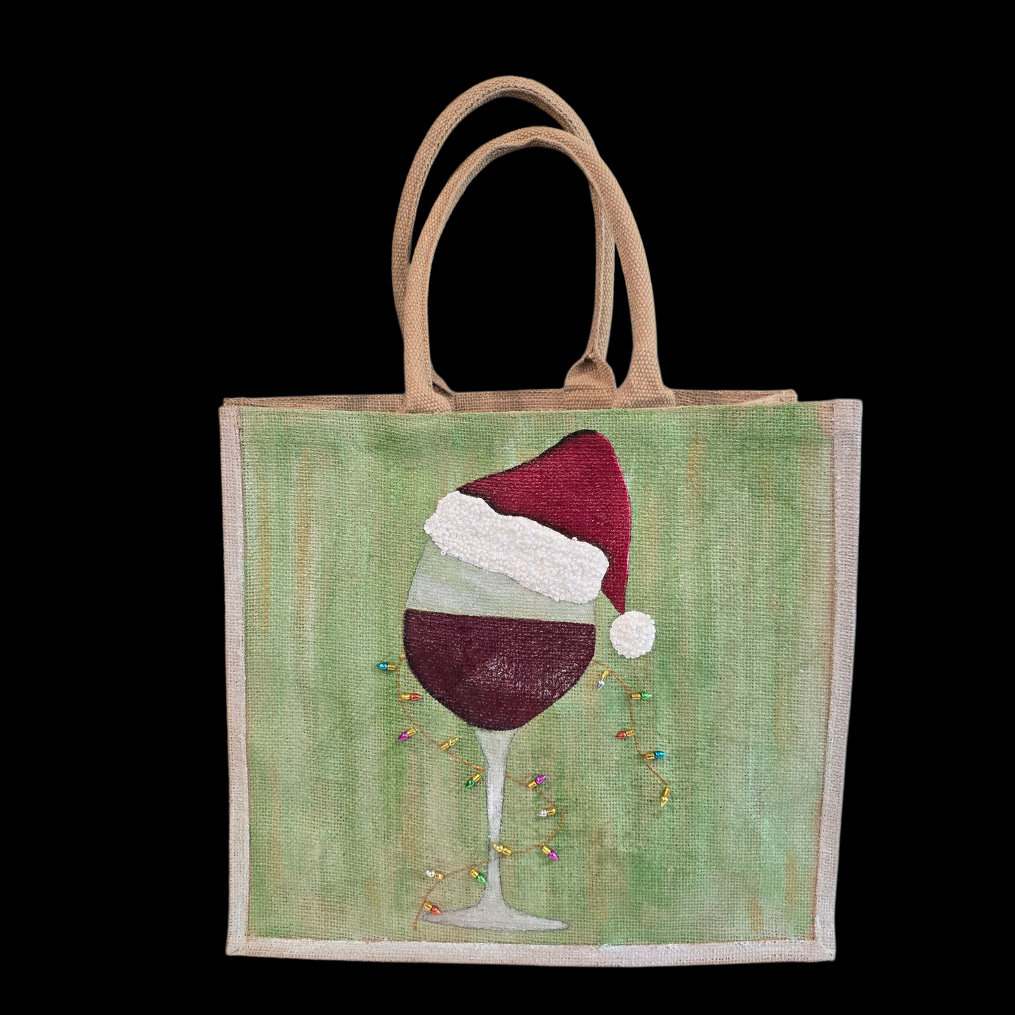 Hand-painted jute tote with a wine glass wearing a Santa hat and tiny holiday lights.