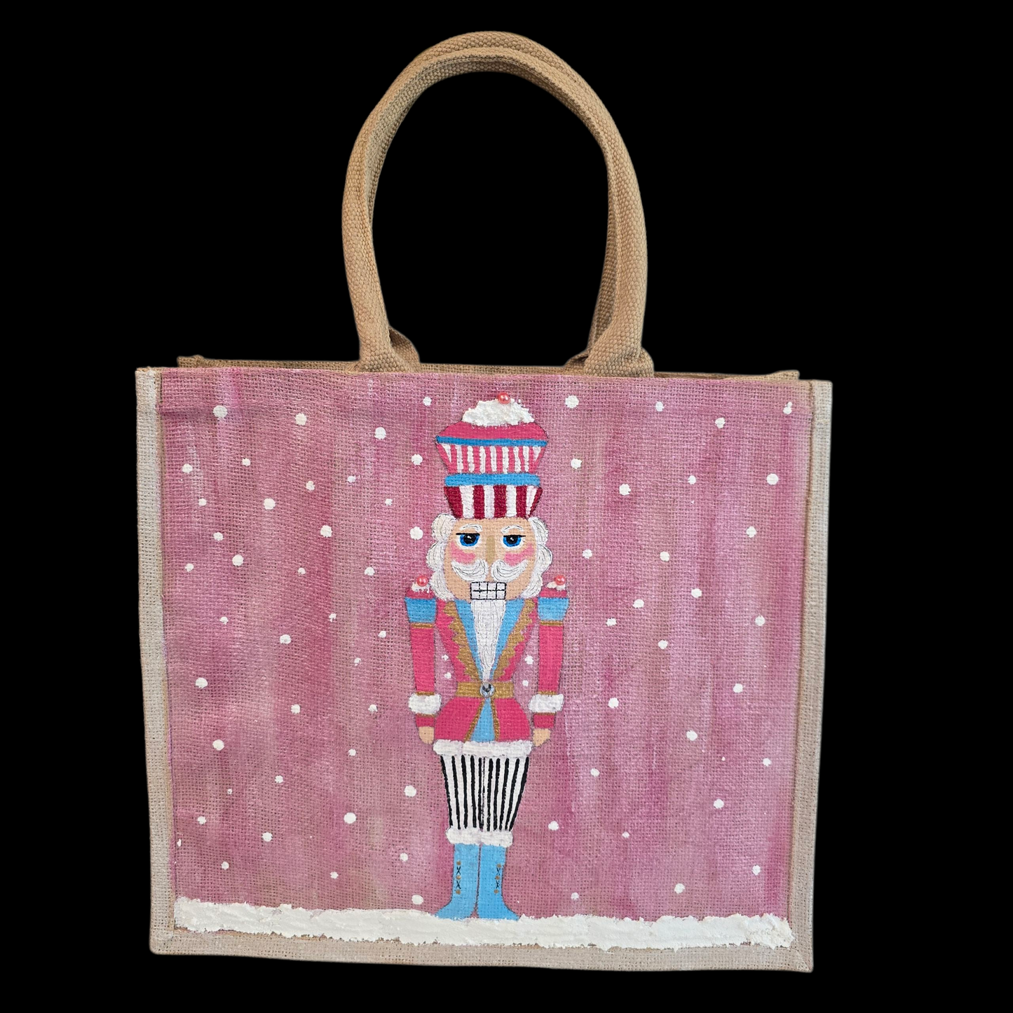 Hand-painted pink Nutcracker on a snowy background, on a jute tote bag.