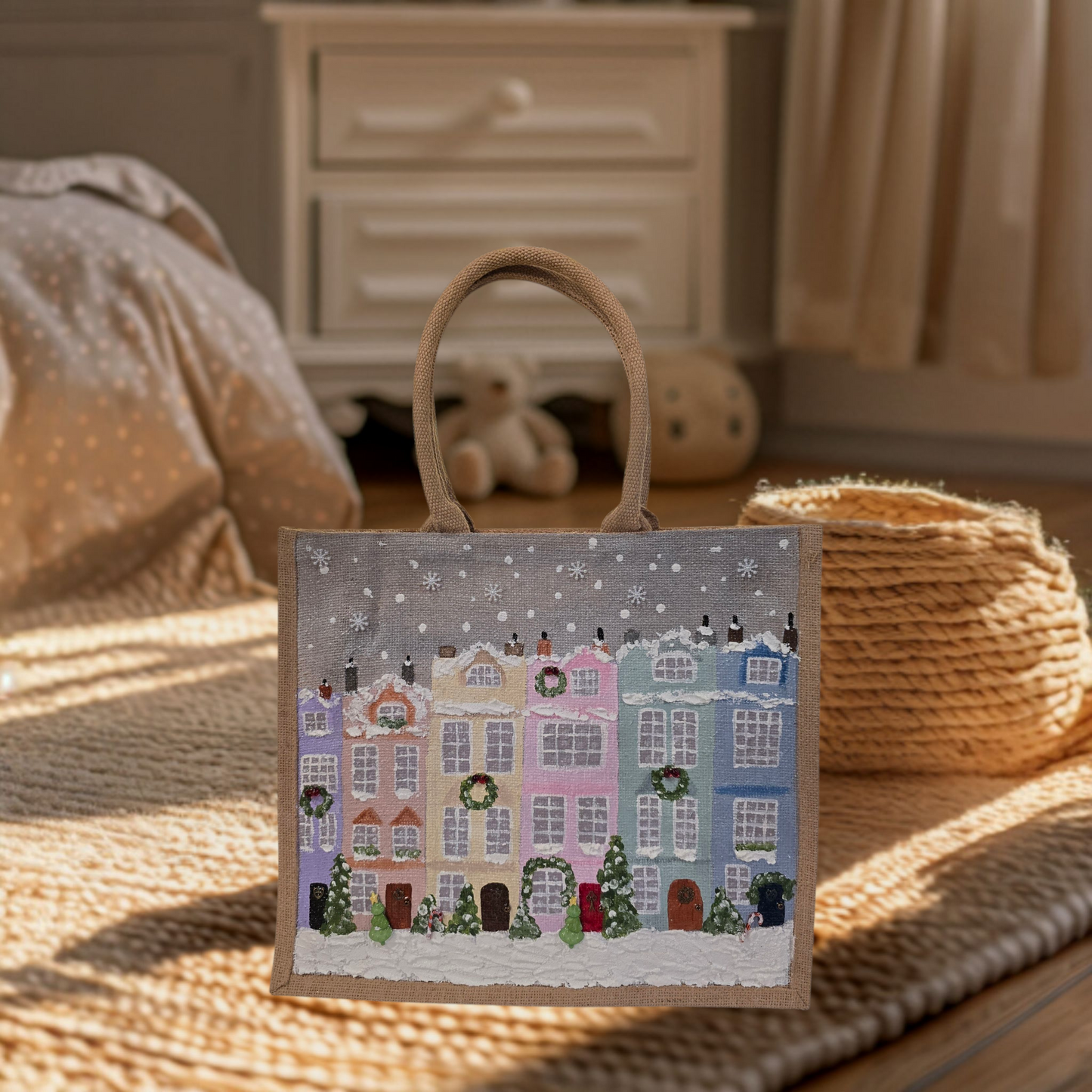 Hand-painted pastel gingerbread row houses in the snow on jute tote, Holiday village street artwork on artisan lined tote, Pastel Christmas houses tote with wreaths and snowfall
