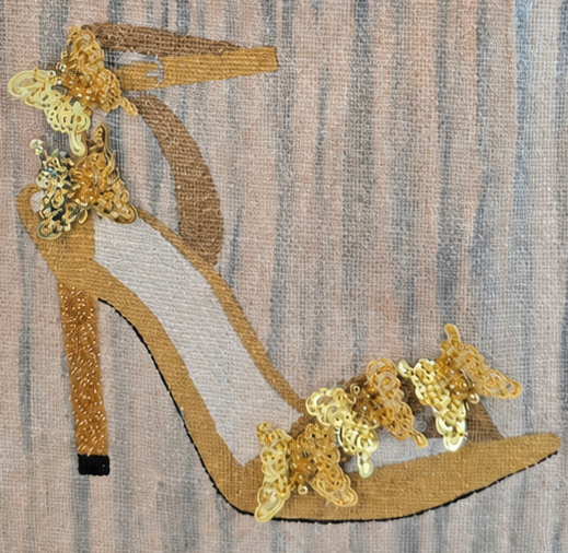 Hand-painted neutral-toned tote bag featuring an elegant gold high-heel sandal embellished with shimmering floral sequins on a soft gray and beige textured background. Stylish wearable art handbag with structured jute handles and sophisticated fashion-inspired design.