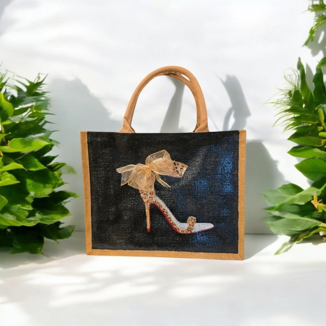 Black jute tote bag with hand-painted copper animal print stilettos and red soles, featuring beaded embellishments.
