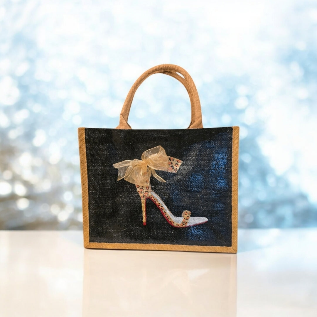 Black jute tote bag with hand-painted copper animal print stilettos and red soles, featuring beaded embellishments.