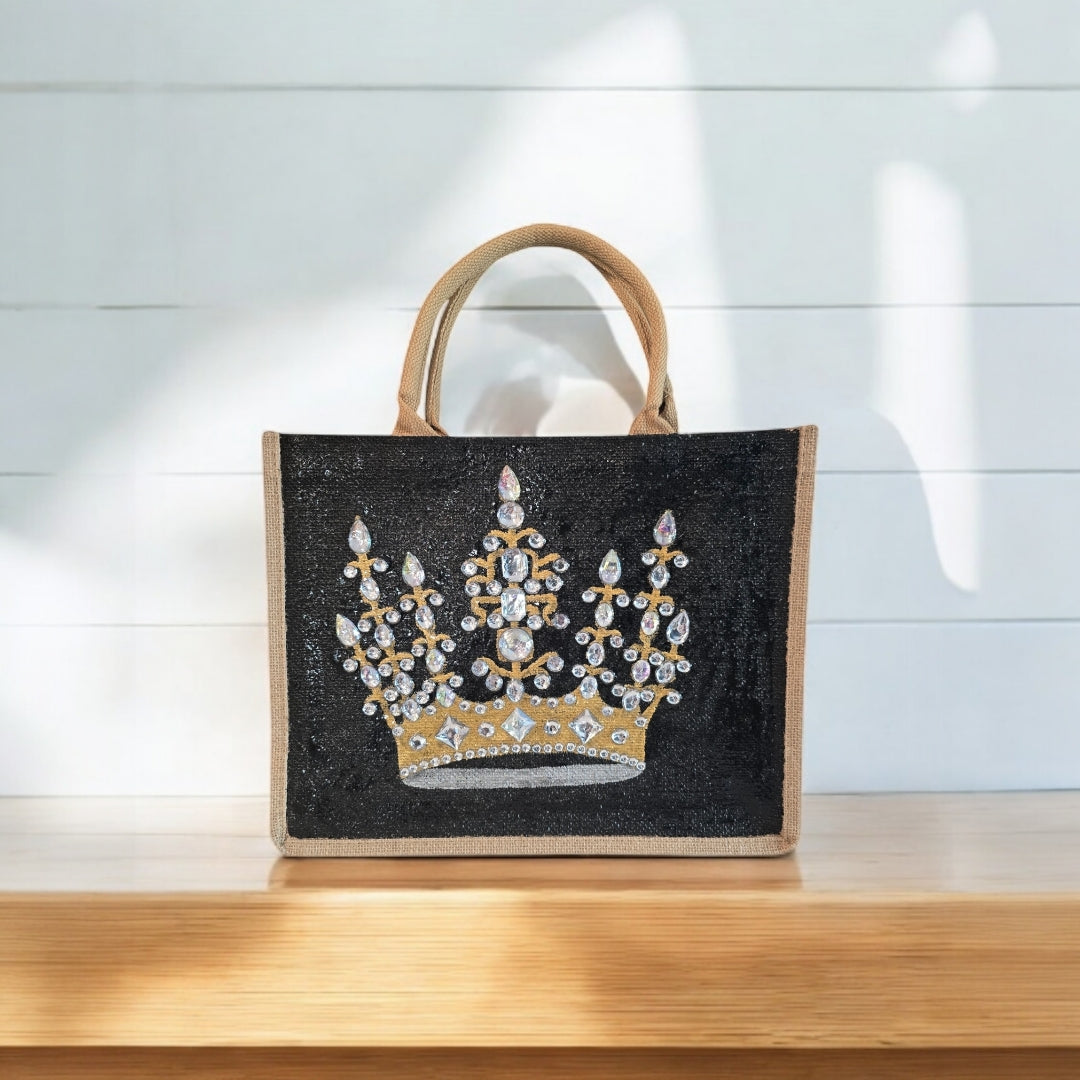 Black jute tote bag with hand-painted gold crown and sparkling beaded accents.