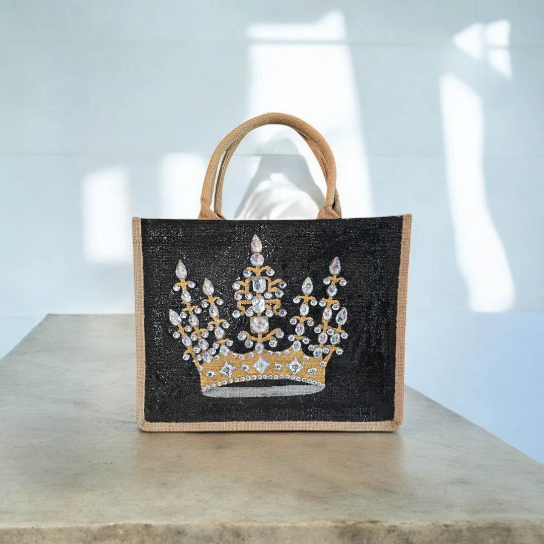 Black jute tote bag with hand-painted gold crown and sparkling beaded accents.
