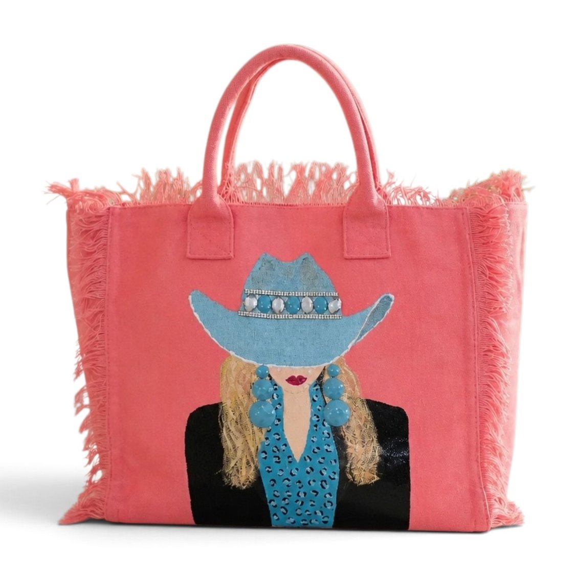 Turquoise Trails hand-painted Western cowgirl pink fringed tote bag featuring handcrafted embellishments and wearable art design.