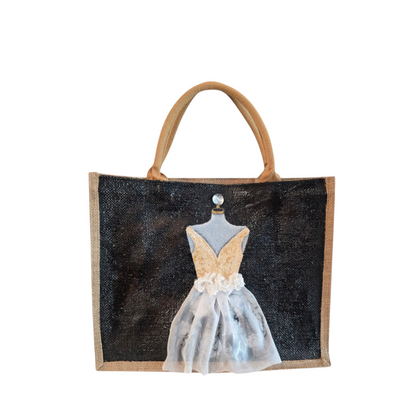 Black jute tote bag with hand-painted white wedding dress design and beaded embellishments.
