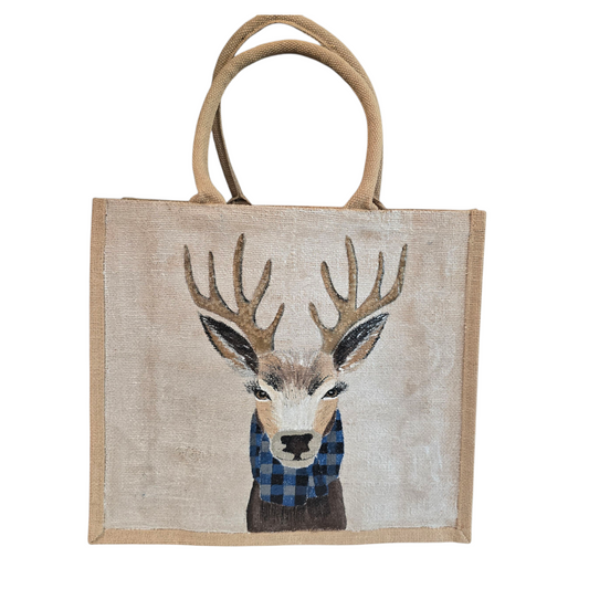 Hand-painted jute tote featuring a reindeer wearing a blue buffalo-plaid scarf.
