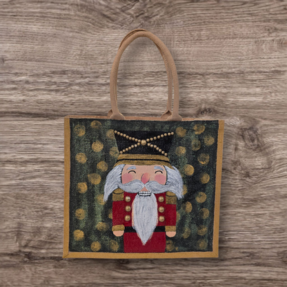 Hand-painted classic nutcracker tote with golden bokeh background, 
Festive nutcracker artwork on artisan jute bag, Traditional holiday nutcracker on lined jute tote