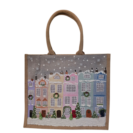 Hand-painted pastel gingerbread row houses in the snow on jute tote, Holiday village street artwork on artisan lined tote, Pastel Christmas houses tote with wreaths and snowfall