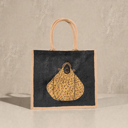 Hand-painted black jute purse tote with gold leopard design and chain handles