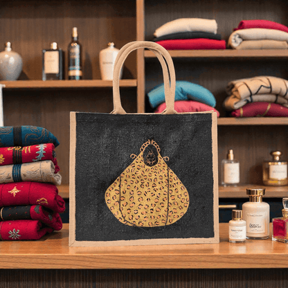 Hand-painted black jute purse tote with gold leopard design and chain handles