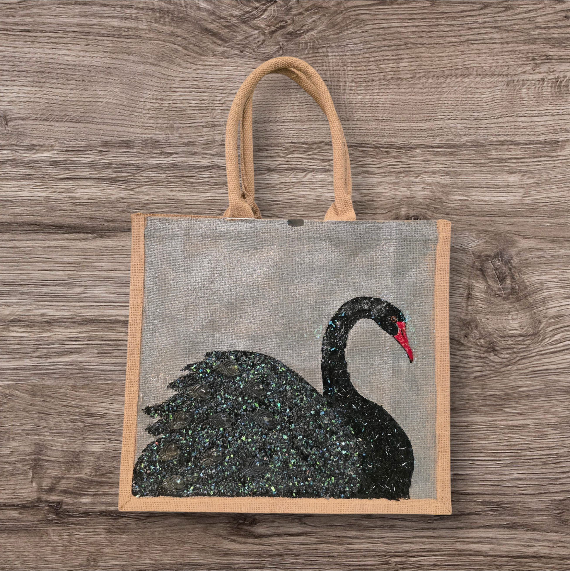 Hand painted and embellished black swan tote bag by Dana's Uncommon Glass