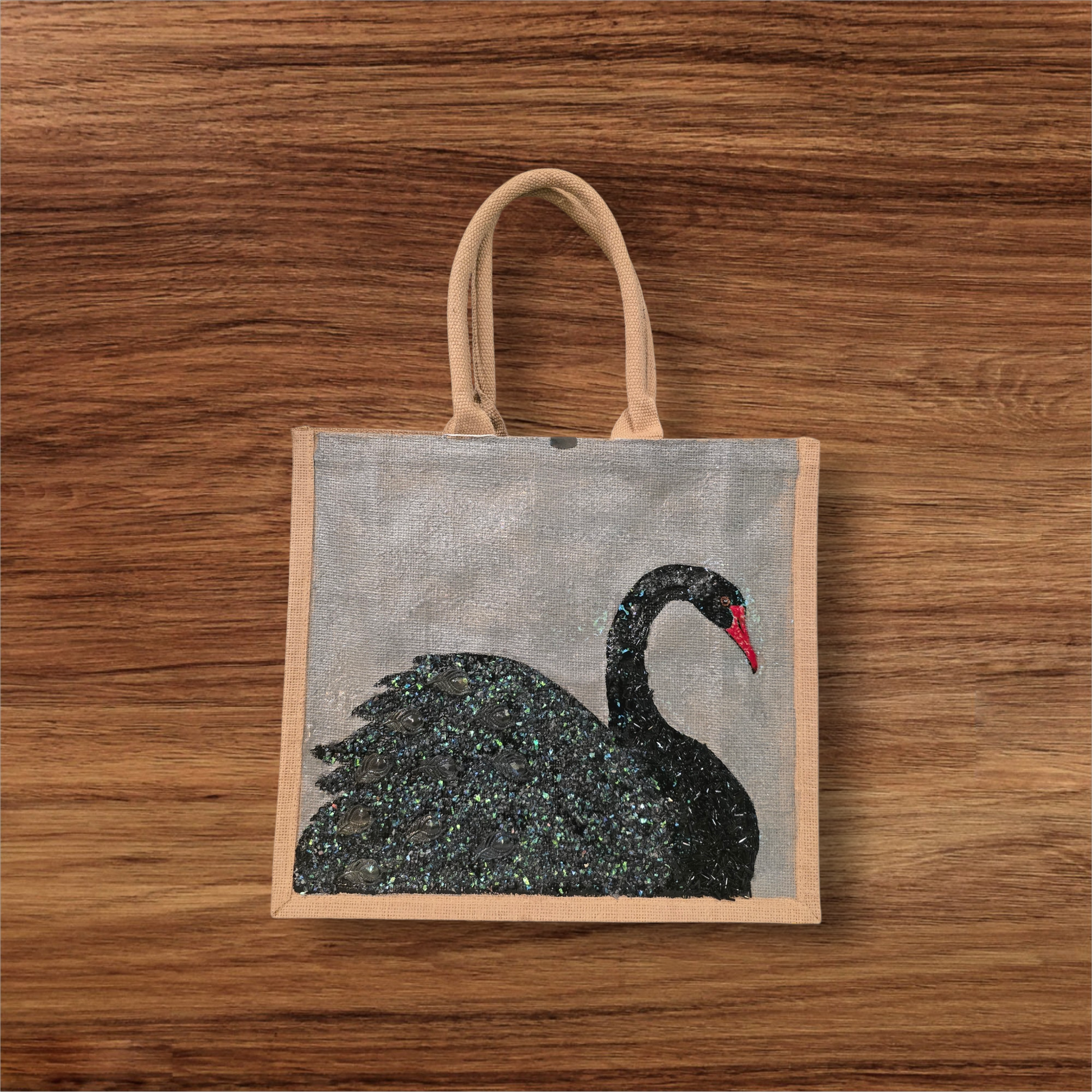 Hand painted and embellished black swan tote bag by Dana's Uncommon Glass