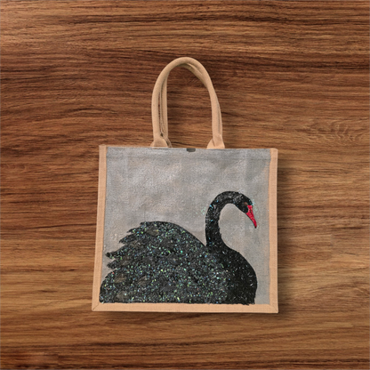 Hand painted and embellished black swan tote bag by Dana's Uncommon Glass