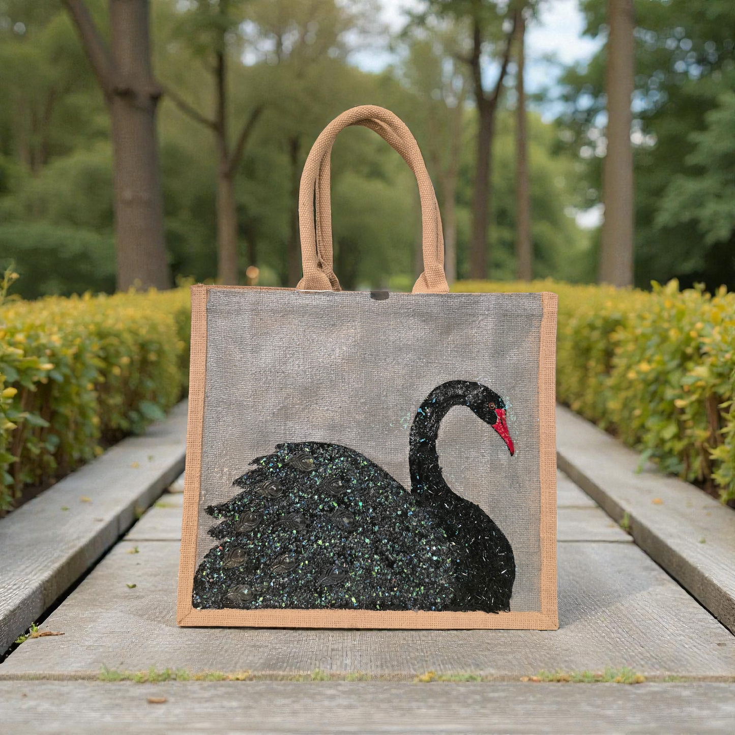 Hand painted and embellished black swan tote bag by Dana's Uncommon Glass