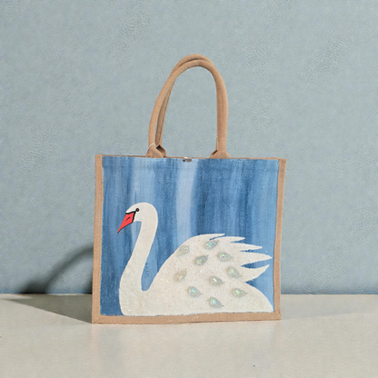 Hand Painted and embellished white swan tote bag by Dana's Uncommon Glass