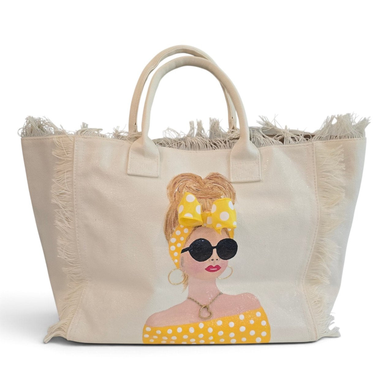 Sunshine Muse hand-painted fringed canvas tote with blonde woman in yellow polka dots and sunglasses