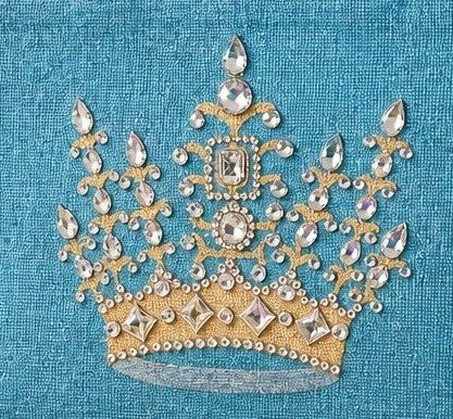 Close up of Hand-painted turquoise jute tote bag featuring a jeweled gold crown design embellished with sparkling rhinestones and pearls, finished with natural burlap trim and rounded handles.