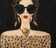 close up of Hand-painted black fringed tote bag with glam sunglasses woman design and leopard print detail