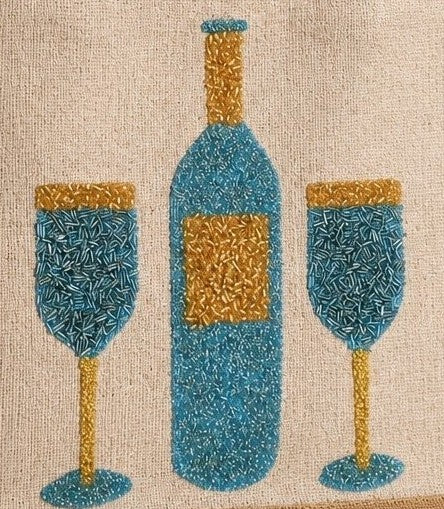 Close Up of Hand-painted jute tote bag featuring a blue wine bottle and two wine glasses in textured blue and gold detailing on a natural canvas background with braided handles.