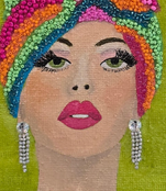 close up of and-painted Vivid Muse tote bag featuring a stylish woman with a colorful beaded headwrap, bold makeup, and sparkling jewelry on a vibrant green background, a unique artistic fashion statement bag.