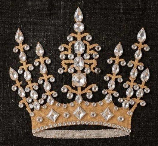 Close up of Hand-painted black jute tote bag featuring an ornate gold crown design embellished with sparkling rhinestones and crystal accents, finished with natural burlap handles and trim.