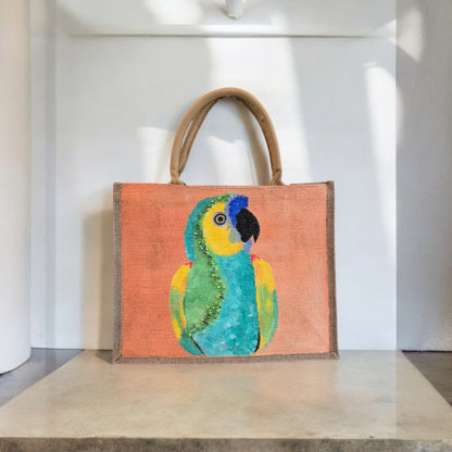 parrot on orange tote bag, tropical parrot tote, hand painted parrot jute bag, eco-friendly bird tote