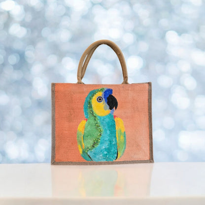 parrot on orange tote bag, tropical parrot tote, hand painted parrot jute bag, eco-friendly bird tote