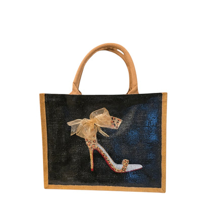 Black jute tote bag with hand-painted copper animal print stilettos and red soles, featuring beaded embellishments.