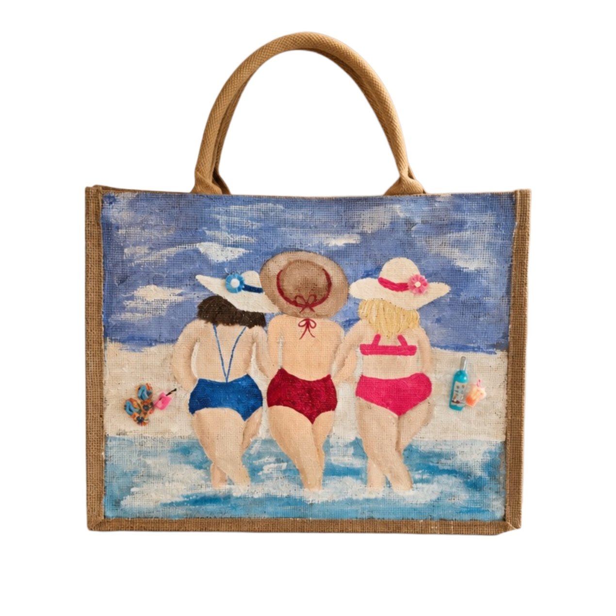 Hand-painted beach girlfriends jute tote bag featuring three women walking into the ocean in colorful swimsuits, accented with beach accessories and a soft blue coastal background