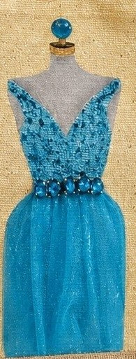 close up of Hand-painted jute tote bag featuring a sparkling turquoise blue dress on a mannequin, accented with jeweled embellishments and soft neutral tones for an elegant fashion-inspired look.