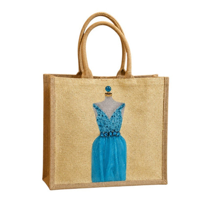 Hand-painted jute tote bag featuring a sparkling turquoise blue dress on a mannequin, accented with jeweled embellishments and soft neutral tones for an elegant fashion-inspired look.