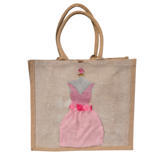 Hand-painted jute tote bag featuring a blush pink bridesmaid dress with floral details on a natural canvas background