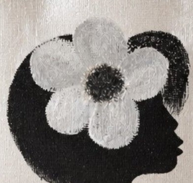 close up of Hand-painted jute tote bag featuring a minimalist black silhouette of a woman in profile with a bold white flower in her hair on a pearl white background. This chic neutral tote includes natural jute handles, a magnetic closure, and modern wearable art styling.