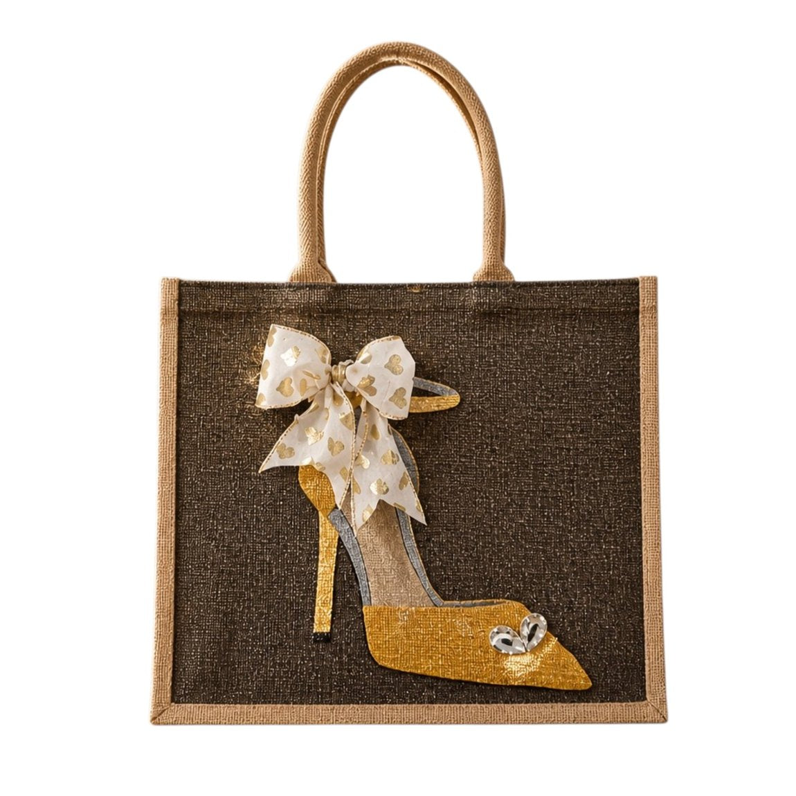 Hand-painted jute tote bag featuring a gold glitter stiletto shoe on a dark background, accented with a sheer ivory bow with metallic heart details and crystal embellishments.
