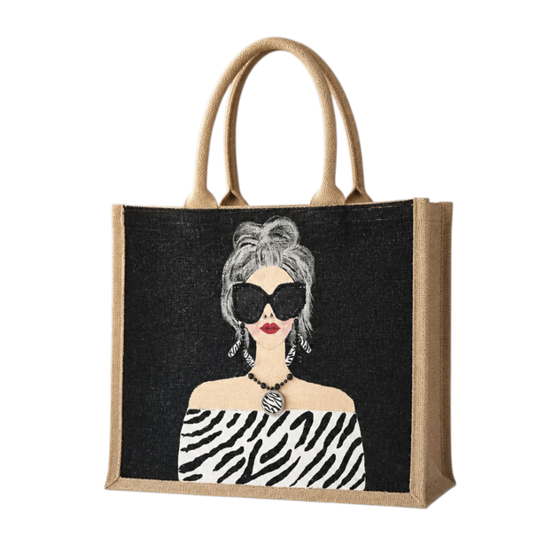 Hand-painted black and white fashion tote bag with zebra-inspired outfit and stylish woman illustration on jute tote