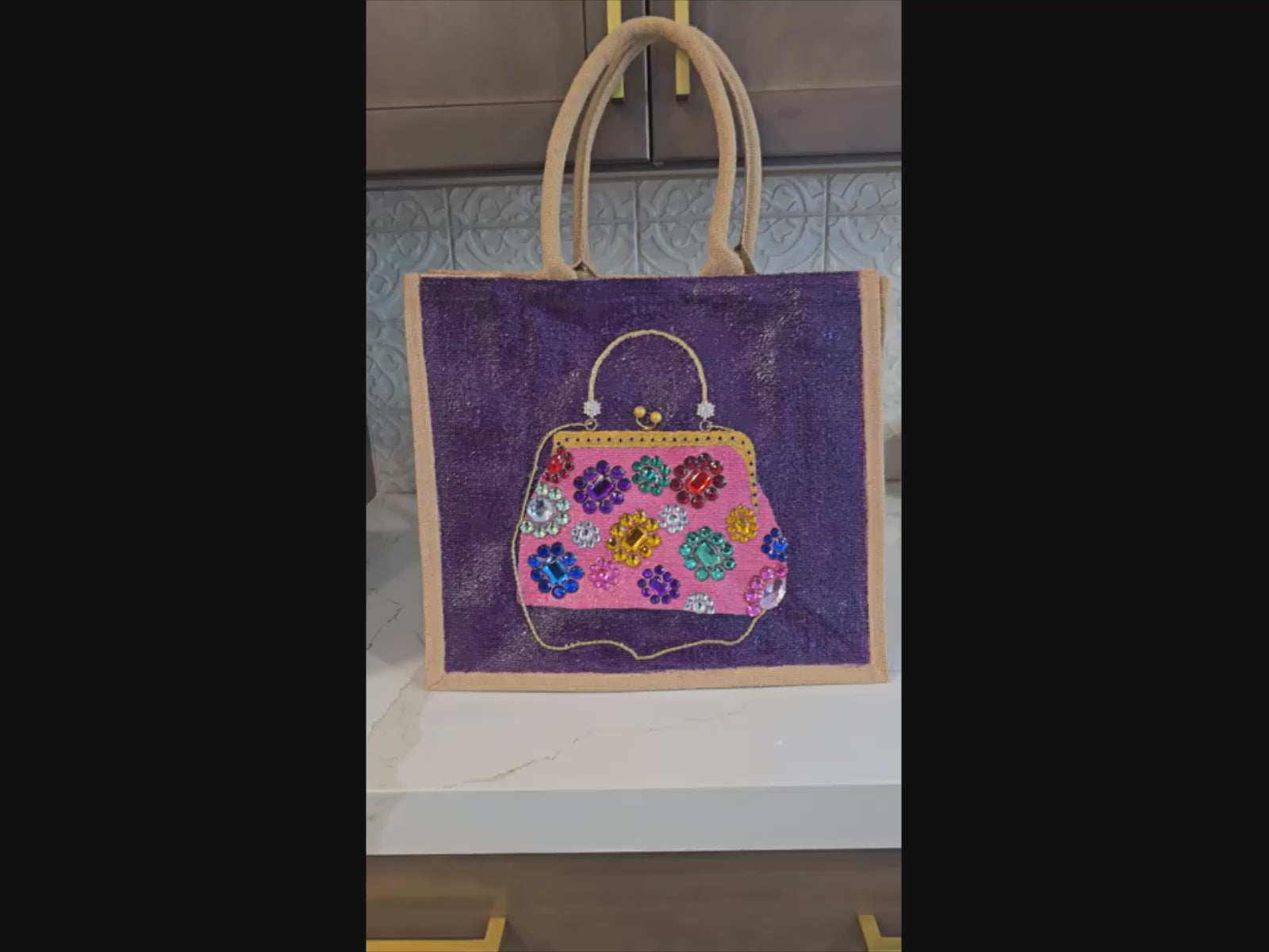 video of Hand-painted floral jewel purse tote on purple jute with multicolor rhinestone flowers