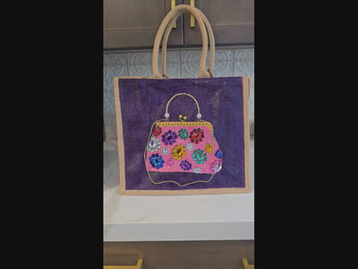 video of Hand-painted floral jewel purse tote on purple jute with multicolor rhinestone flowers