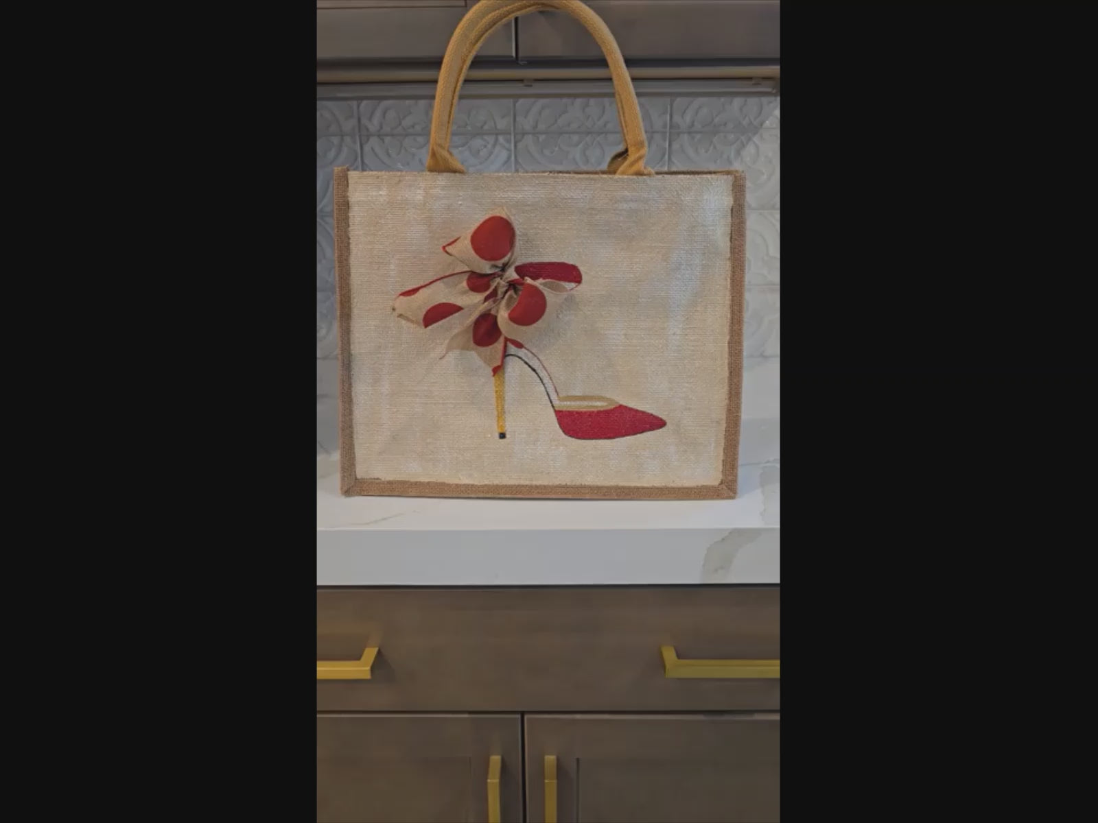 Off white jute tote bag with hand-painted red stilettos featuring tan polka dots, accented with bead details.
