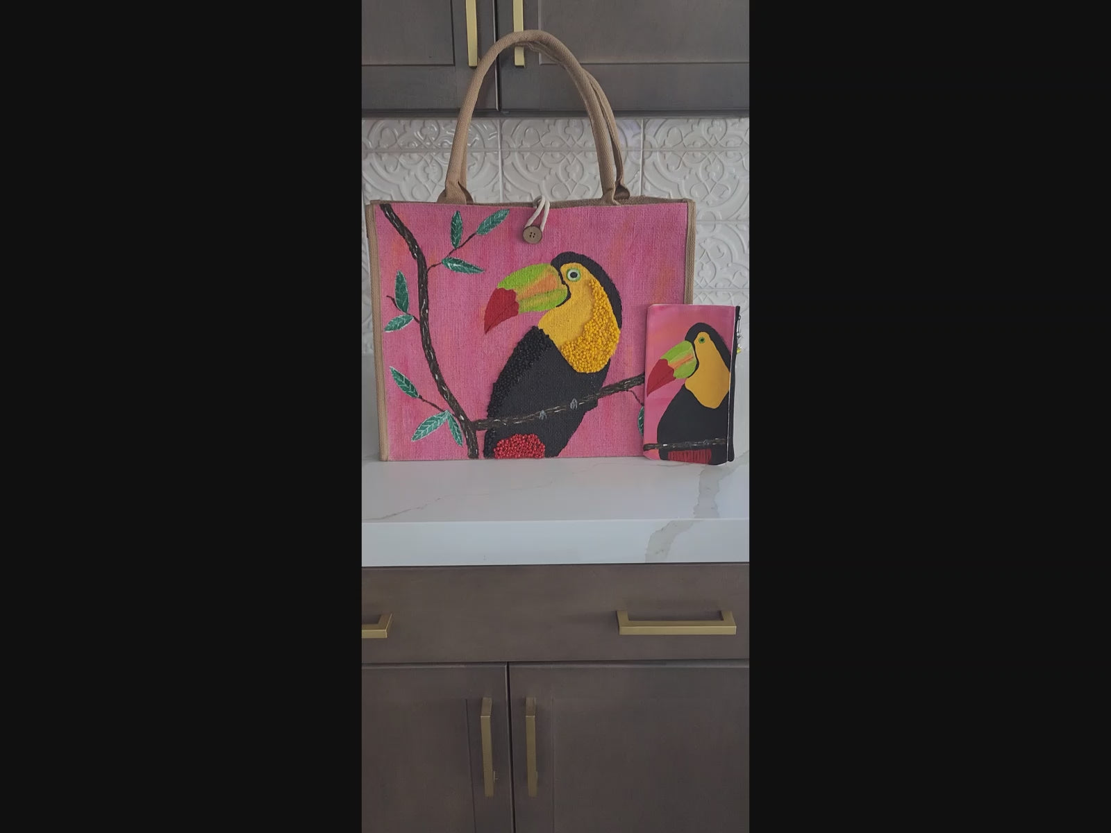 Video of toucan on pink tote bag, tropical bird tote, hand painted toucan jute bag, eco-friendly toucan market bag