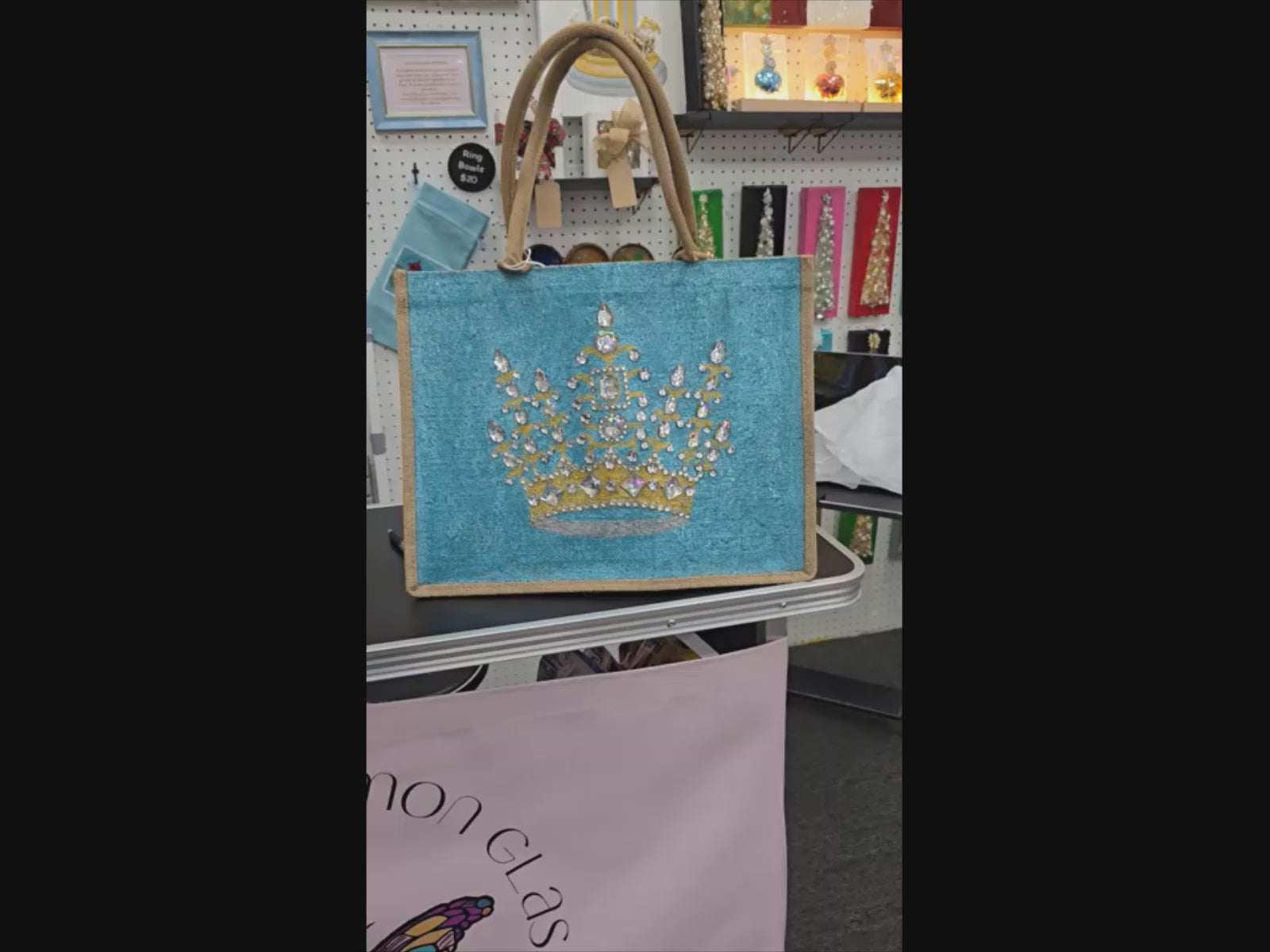 Video of gold crown tote bag, metallic turquoise tote bag, queen tote bag, princess tote bag, beaded crown jute bag, eco-friendly tote