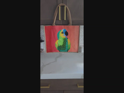 video of parrot on orange tote bag, tropical parrot tote, hand painted parrot jute bag, eco-friendly bird tote