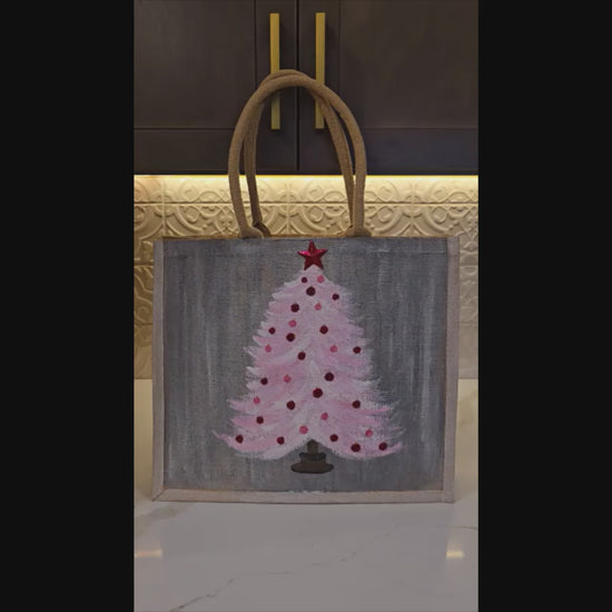 Hand-painted pink Christmas tree with red ornaments on gray, Blush holiday tree tote with star topper on jute bag, 
Modern pink Christmas tote, lined jute with long handles