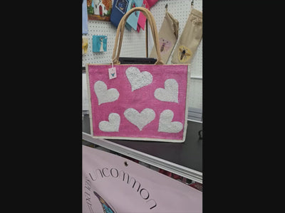 video of white hearts tote bag, metallic pink tote bag, beaded heart jute bag, eco-friendly heart tote, hand painted hearts tote bag